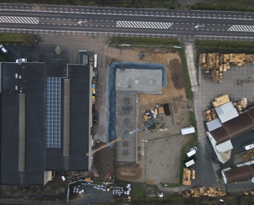 Luchtofoto van de fundering van het nieuwe bureel gebouw